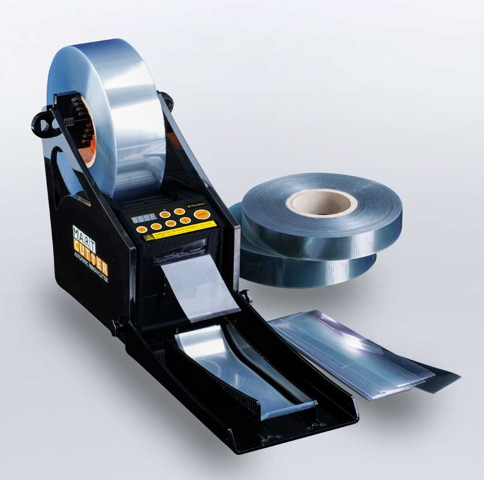 Machine à couper le rhodoïd